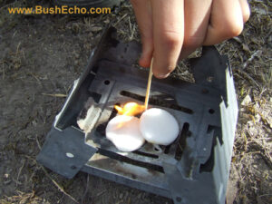 Lighting hexi stove with matches.