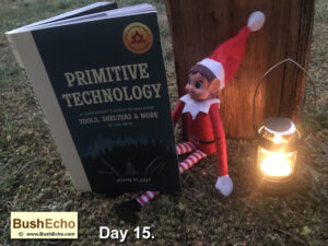 Elf on the Shelf reading Primitive Technology book.